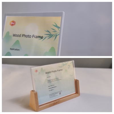 Kryształowo czysta, dostosowywalna pionowa rama fotograficzna z podstawą z macierzystego drewna